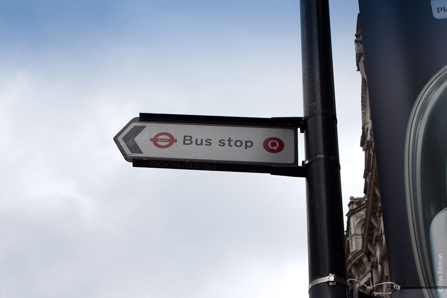 London bus stop with a letter code Q