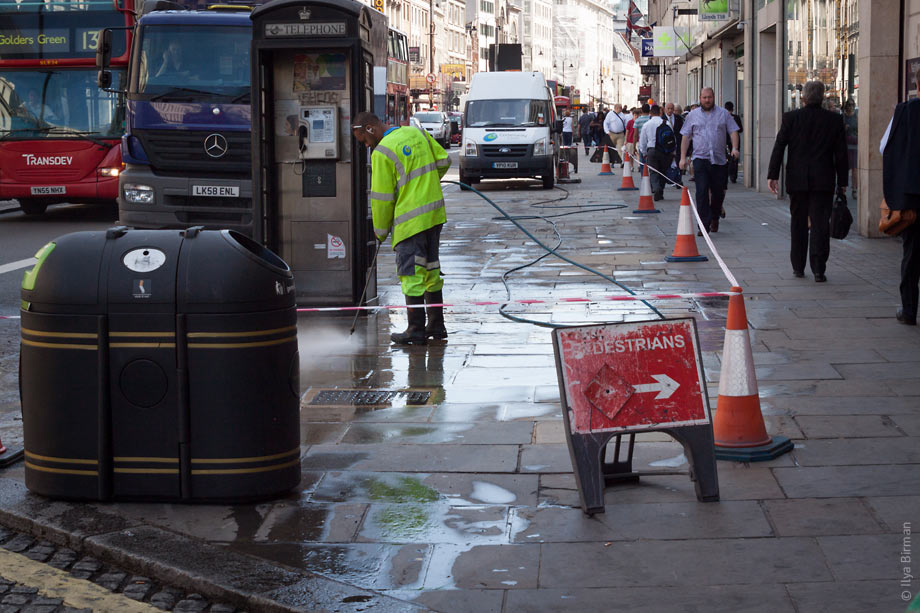 The pavement on the Strand is being washed